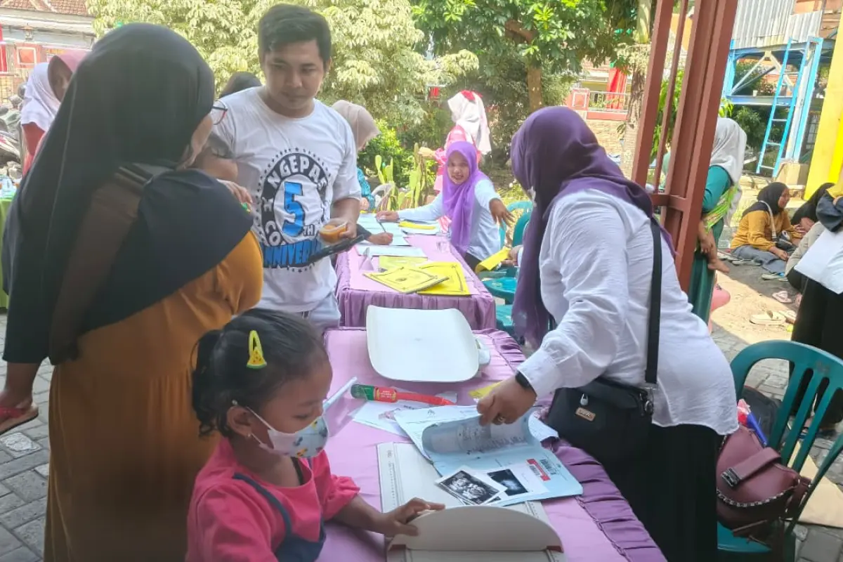 Tawa Balita Warnai Posyandu TMMD 128 Gresik di Desa Slempit