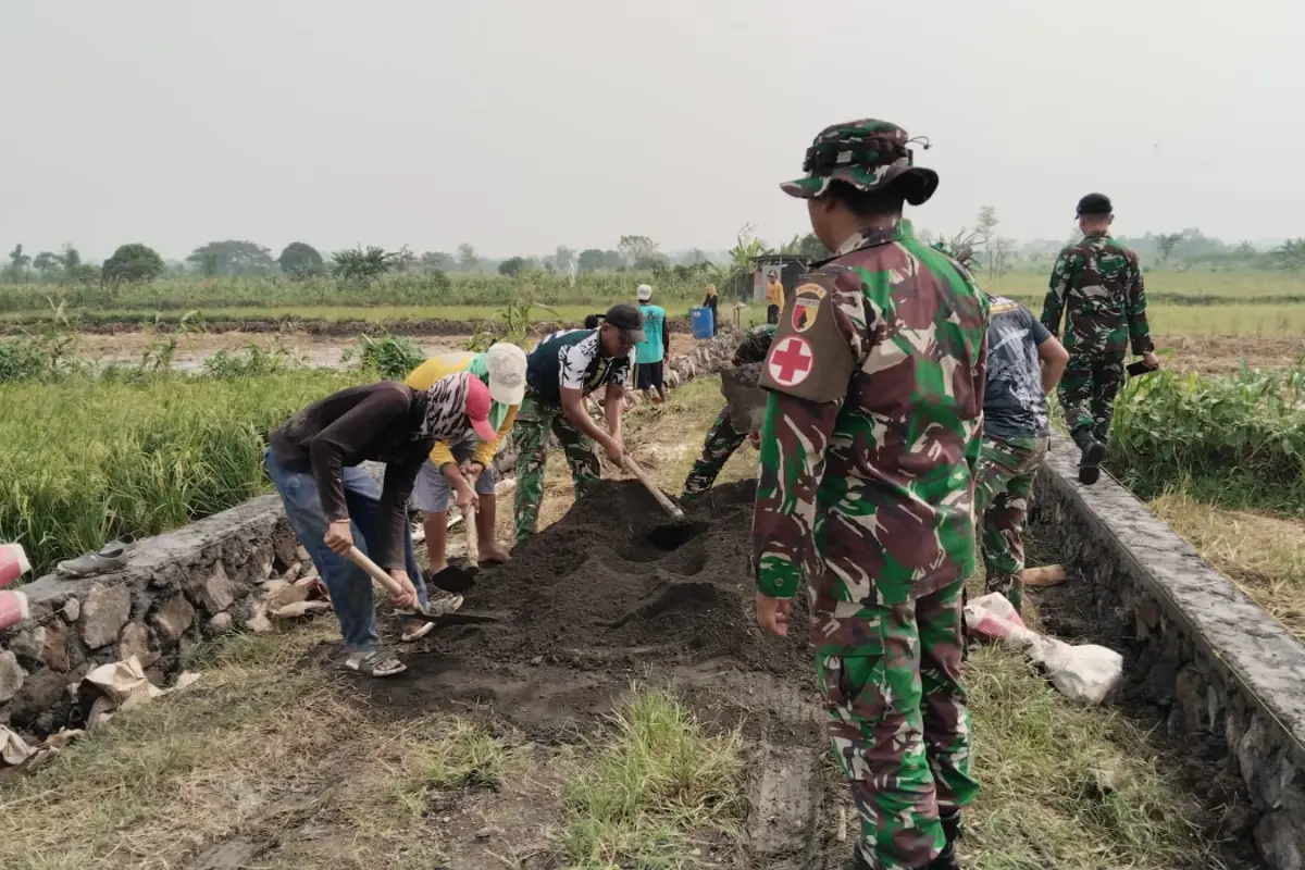 TMMD 128 Gresik Percepat Pembangunan TPT untuk Lindungi Jalan Tani