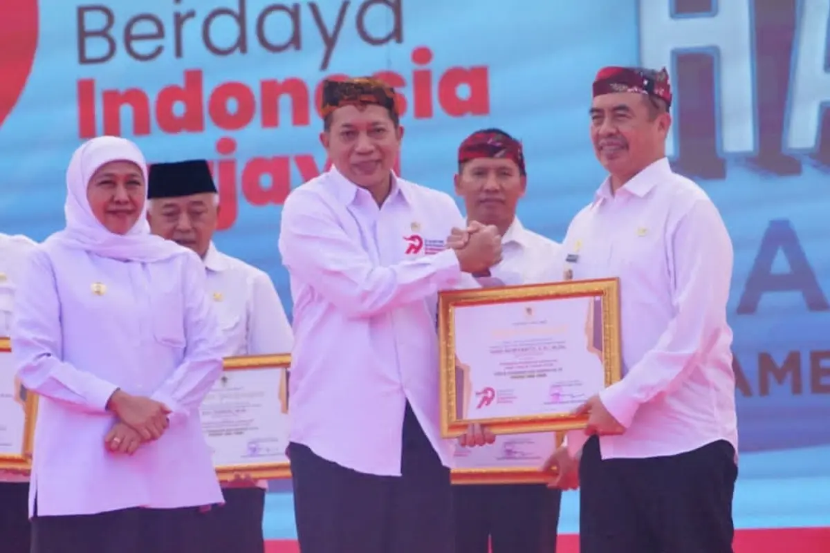 Hadiri Puncak Harkop ke-79, Bupati Madiun Terima Penghargaan Pembina Koperasi Andalan Jatim 2026