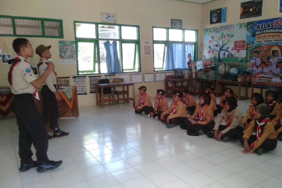 Wujud Dharma Bhakti, Pramuka Garuda MTsN 2 Pacitan Terjun Latih Siswa 7 SD/MI di Kebonagung